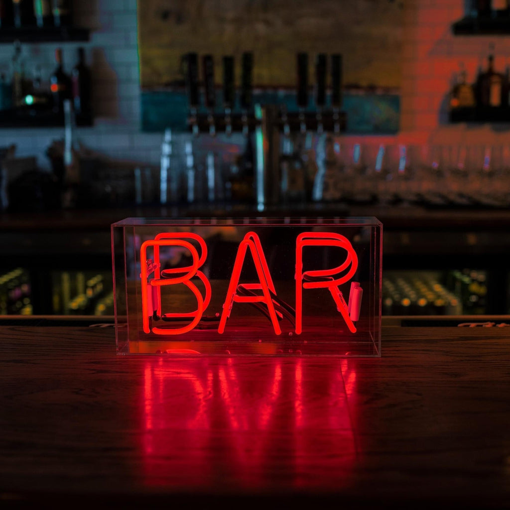 Insegna al neon "BAR" rossa