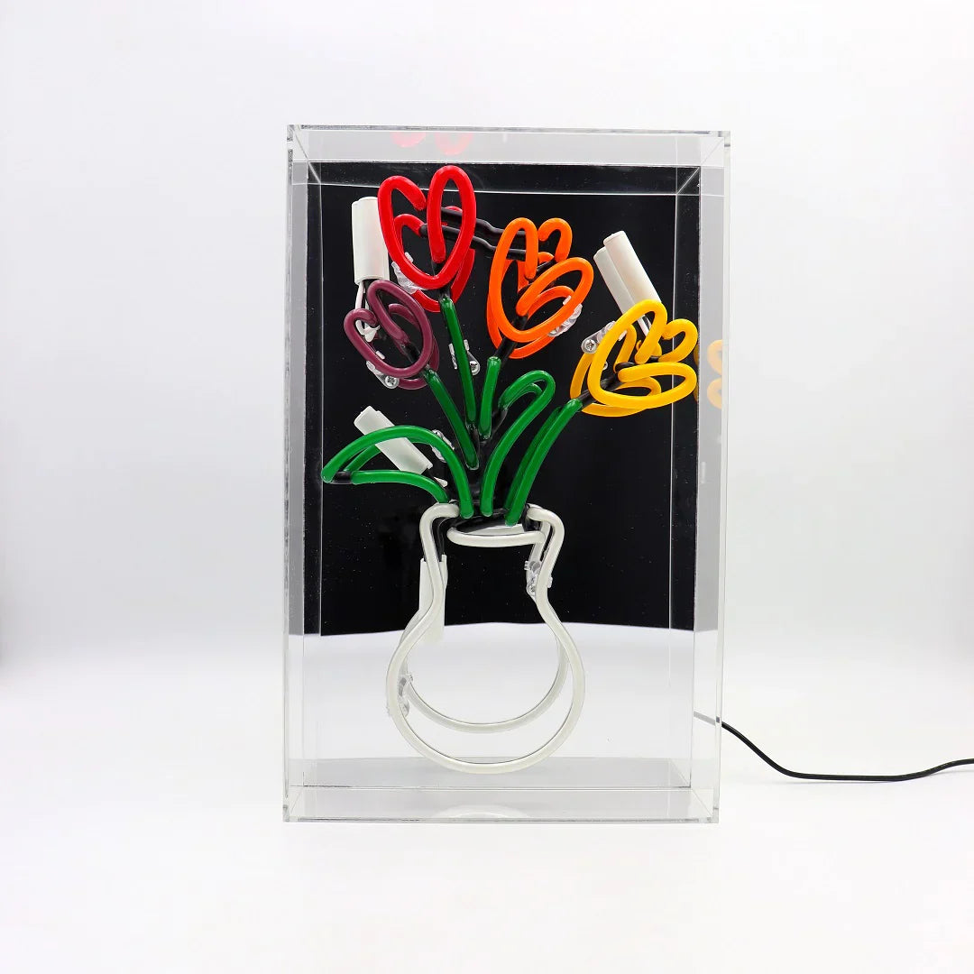 Vaso di tulipani al neon