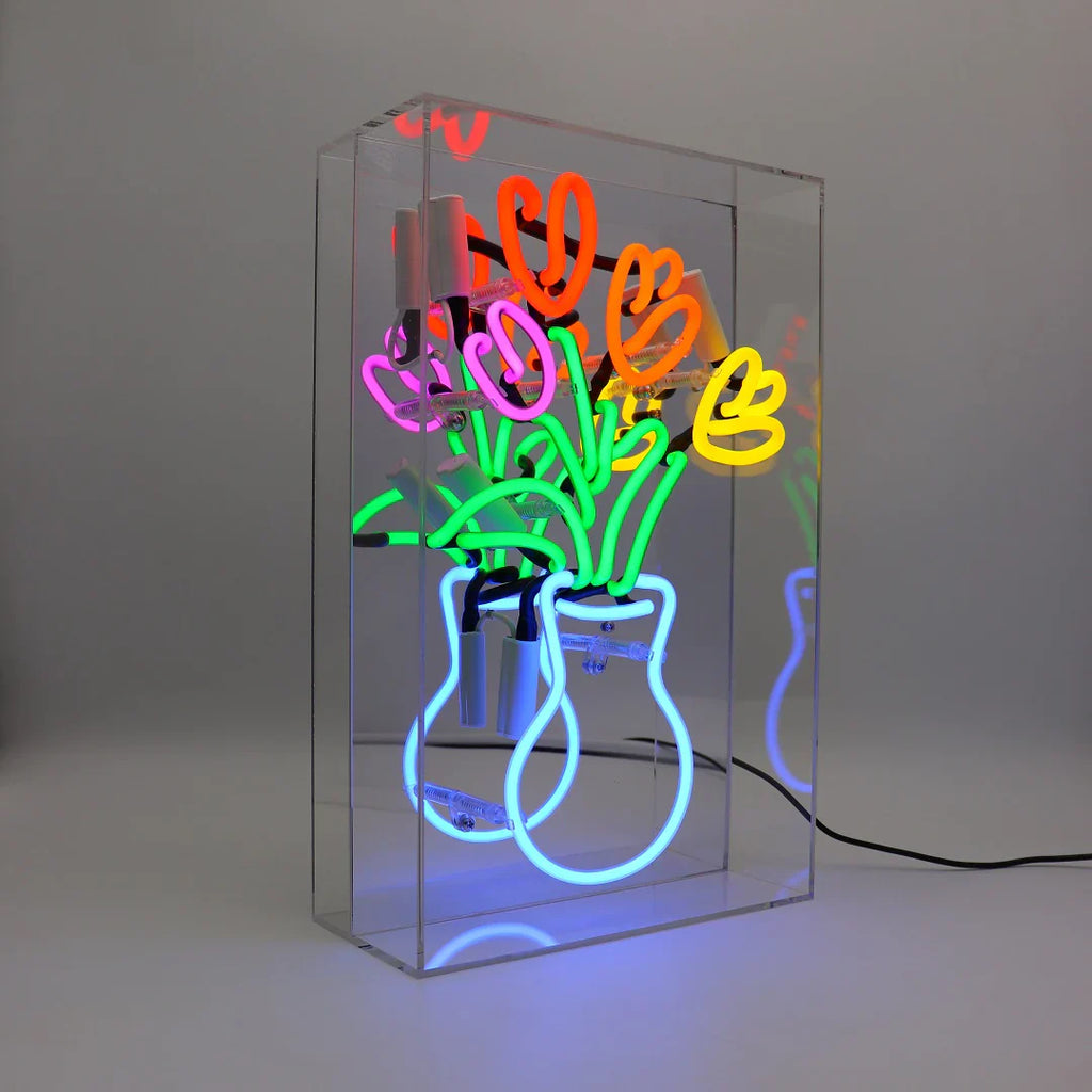 Vaso di tulipani al neon
