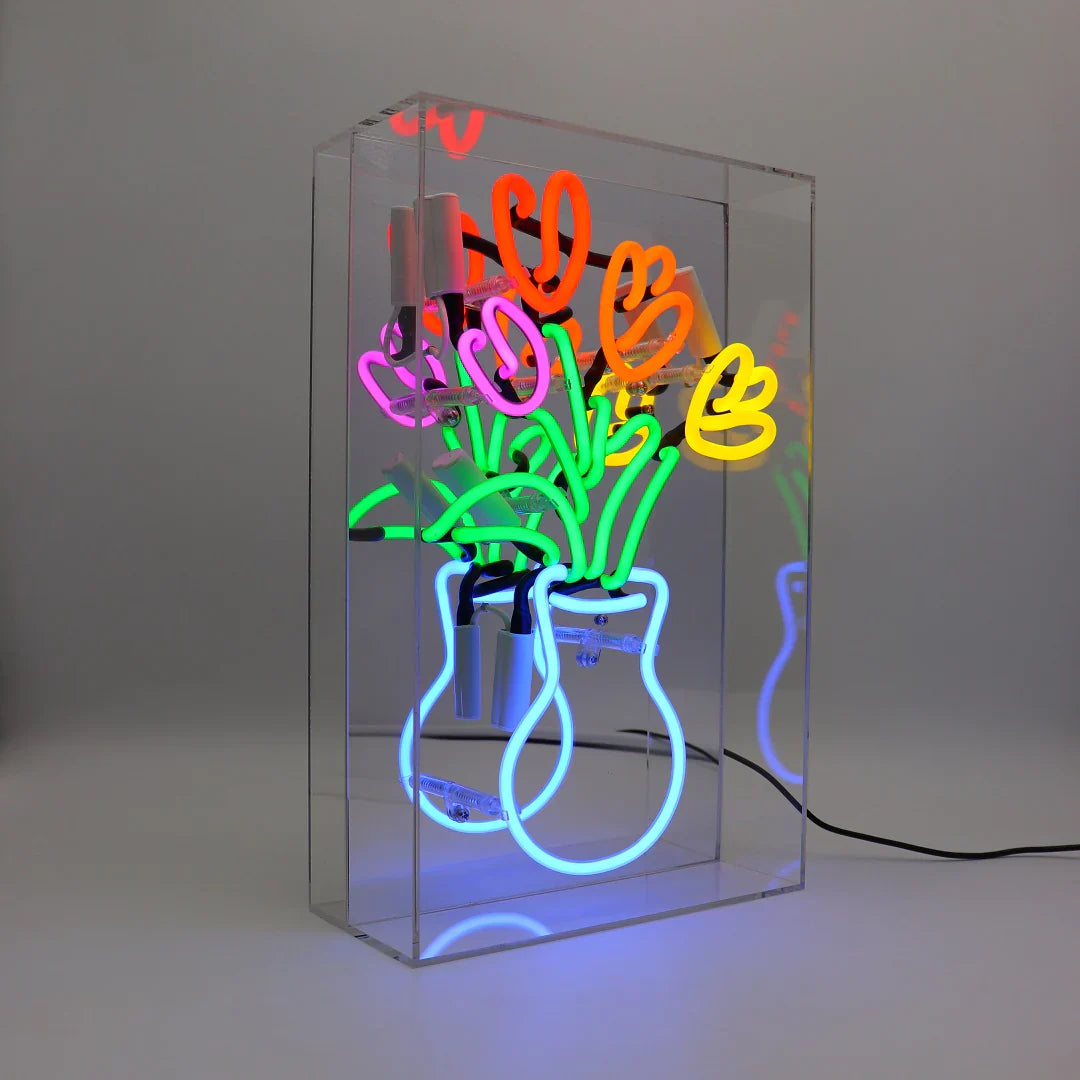Vaso di tulipani al neon